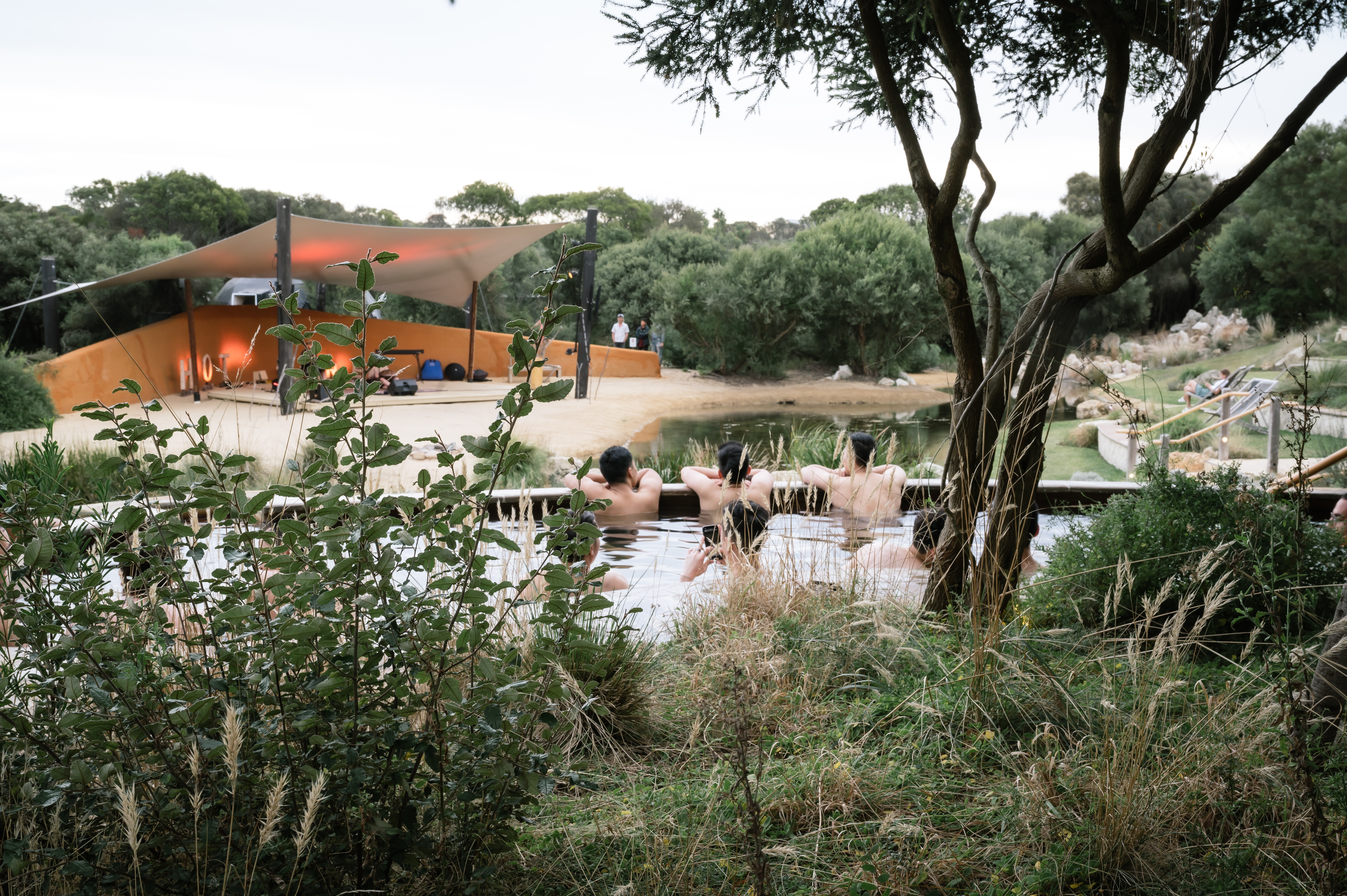 bath-house-amphitheatre-stage-guests-watching-performance-landscape-2.jpg