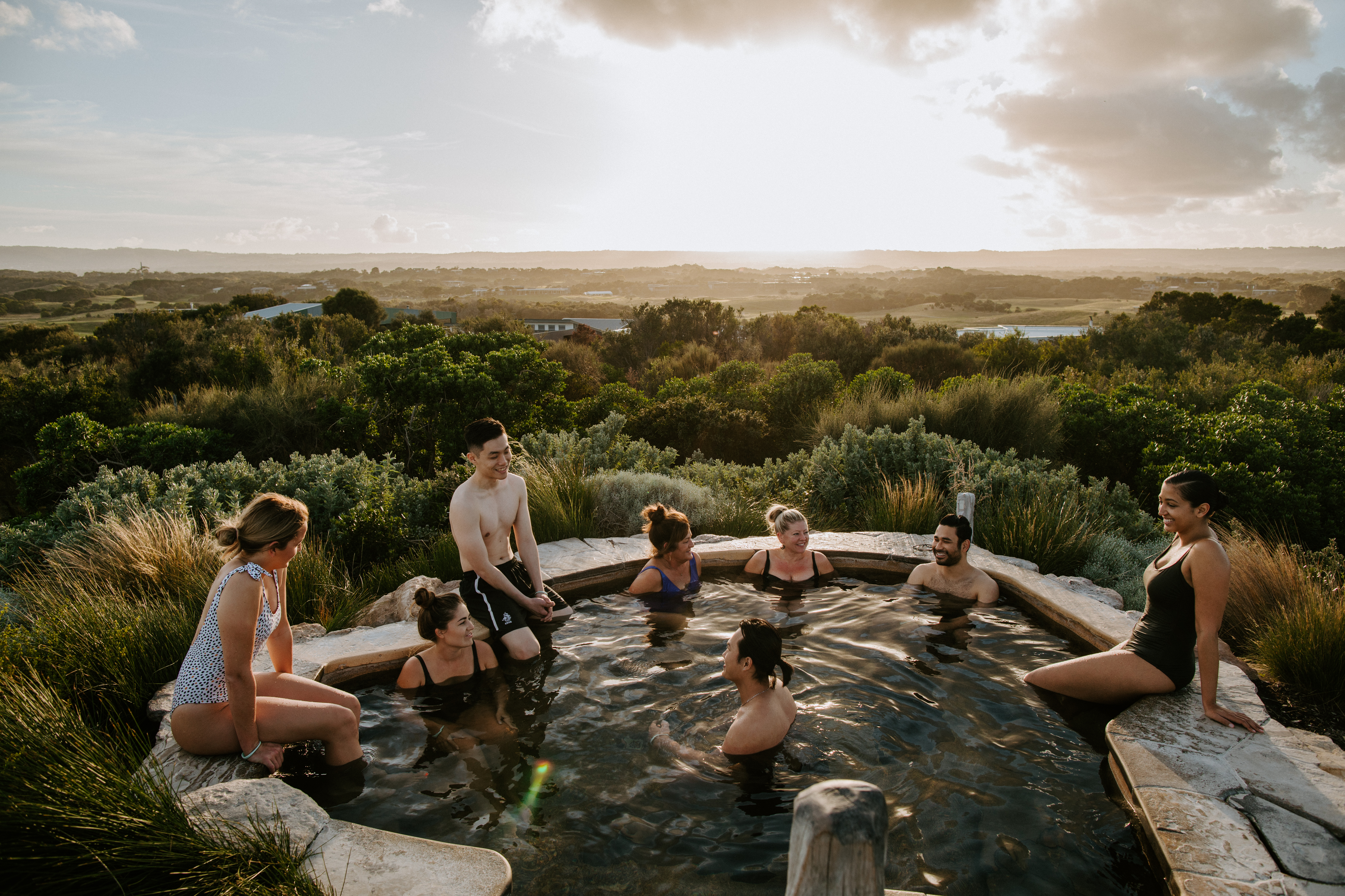 A group of people bathing at hilltop